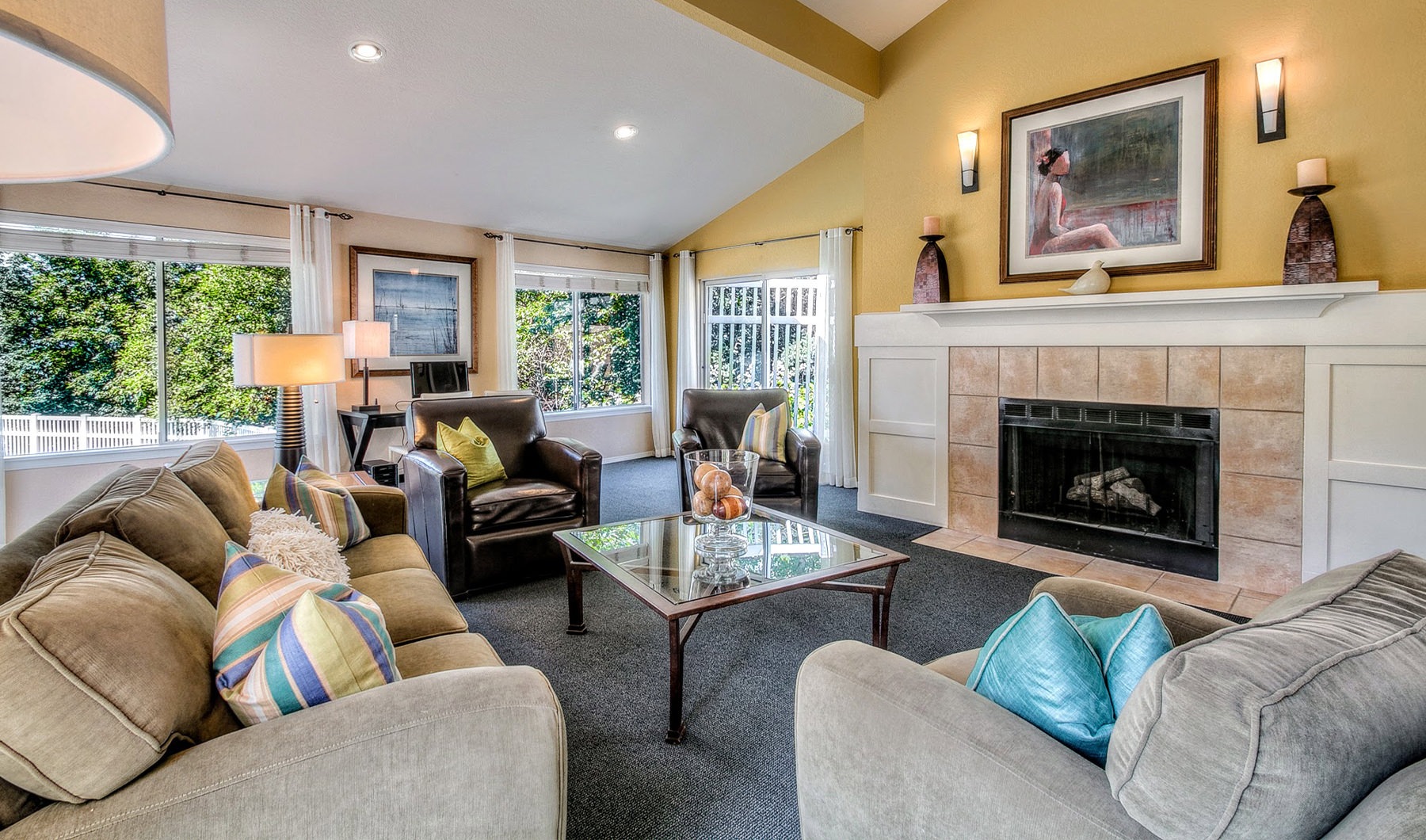 Clubhouse Resident clubhouse with a fireplace and windows